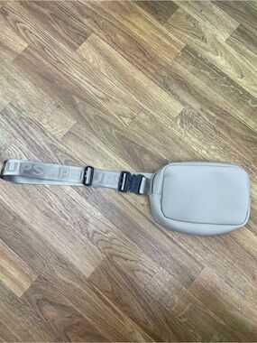 Branded Tan Belt Bag with Adjustable Logo Strap
